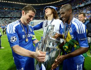 Will Chelsea Qualify For The Champions League? Chelsea look like they may not qualify for the Champions League this time around, which is the next season, 2018-2019. The only way they can qualify is by finishing in the top-4 in the League or by winning the Champions League. Right now, that 4th position looks like the easier of the two. Chelsea has been in such a predicament before. In 2016, the club failed to qualify for the Champions League (2016-2017). But because Chelsea were playing only for the League, their commitments were limited and they managed to lift the League title. When Chelsea Won The Champions League In 2011-2012, Chelsea finished in 6th position, outside the Champions League places but still managed to win the Champions League and automatically qualify for the next season. Chelsea could see themselves in the same shoes again this season unless they win the remainder of their League games and hope for favorable results elsewhere. The last time Chelsea failed to qualify for the Champions League, apart from the 2016-2017 season, was all the way back in 2001-2002. Since then, Chelsea has qualified for the Champions League 15 seasons in a row. Fact: In the last 13 season of the Premier League, Chelsea has won it 5 times. Manchester United has won the League 5 times as well. City won twice with Leicester winning it once in 2016. Where To Put Your Money? The odds look like Chelsea may not qualify for the Champions League in 2018-2019. Should that happen, Hazard will most likely not sign a new contract and will look to leave to greener pastures (Real Madrid) or whoever else can afford the playmaker. Conte’s job will also depend on Chelsea qualifying for the Champions League.